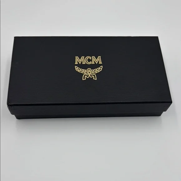 MCM Vibrant Orange Leather Clutch